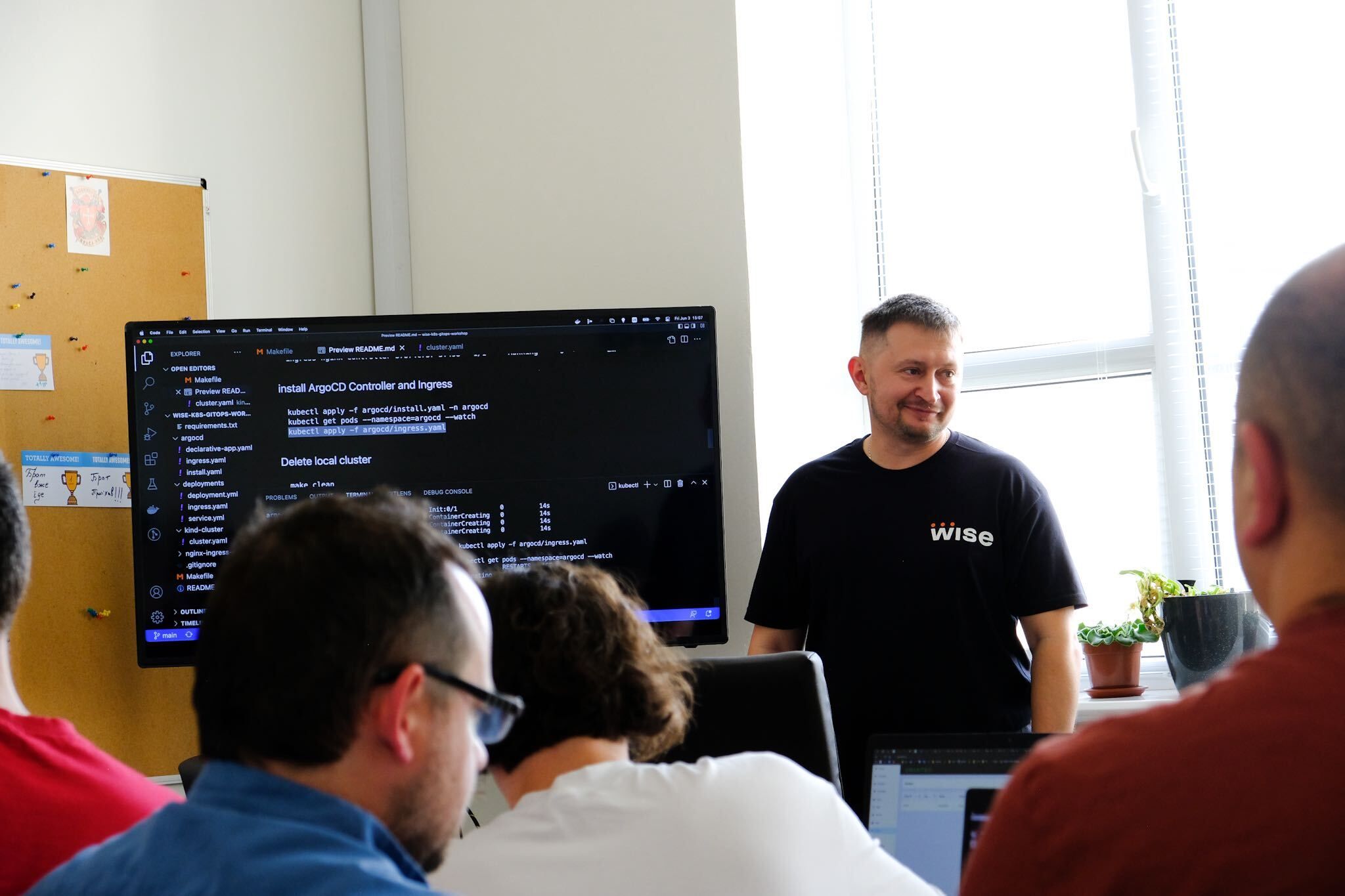 DevOps engineer collaborates across tech teams